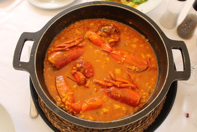 High angle view of soup in container on table