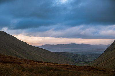 Scenic view of landscape against sky during sunset