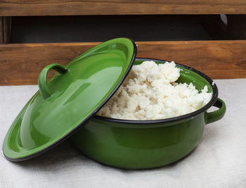 Traditional south african maize meal in rustic green pot