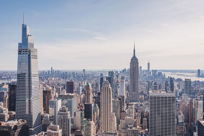 Modern buildings in city against sky