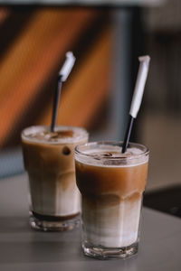 Close-up of coffee in glass on table