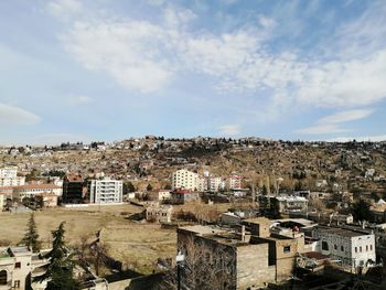 High angle shot of townscape against sky