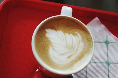 High angle view of cappuccino on table