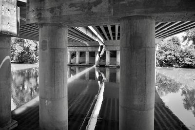 Reflection of bridge on river