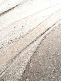 High angle view of sand on beach