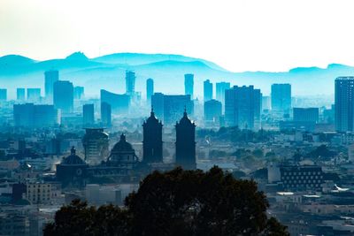 Cityscape against clear sky