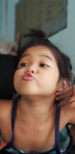 Portrait of cute girl at home