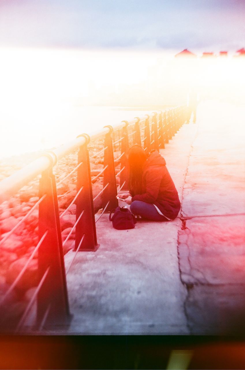 indoors, sunlight, table, sky, sunset, sea, absence, chair, day, no people, red, relaxation, horizon over water, empty, nature, wood - material, beach, water, auto post production filter