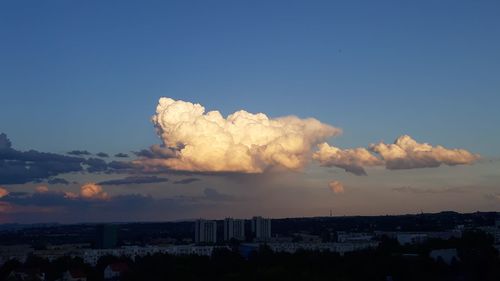 View of townscape against sky at sunset