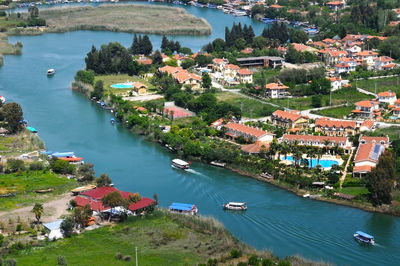 High angle view of townscape by sea