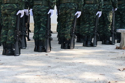 Army soldiers standing on road