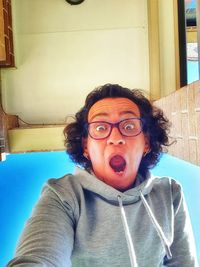 Portrait of mid adult man wearing sunglasses