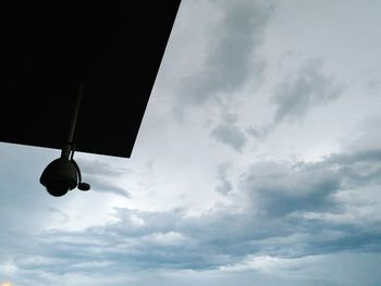 Low angle view of street light against sky