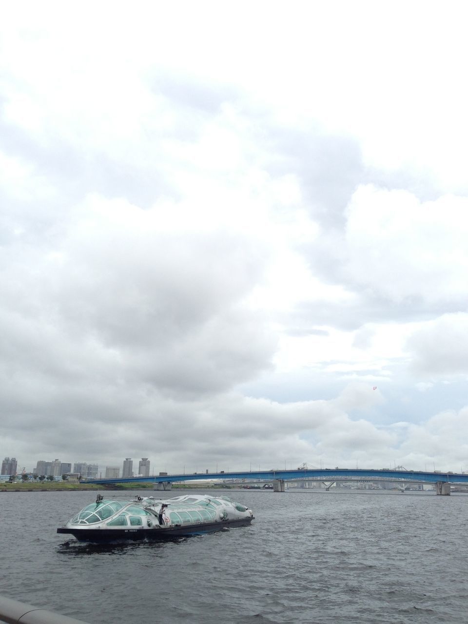 nautical vessel, transportation, mode of transport, water, boat, sea, sky, waterfront, cloud - sky, cloudy, tranquility, tranquil scene, nature, scenics, moored, beauty in nature, sailing, cloud, travel, day