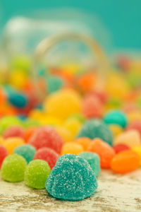 Close-up of multi colored candies on table