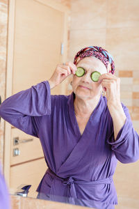 Portrait of young woman wearing mask