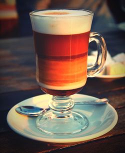 Close-up of coffee in glass on table