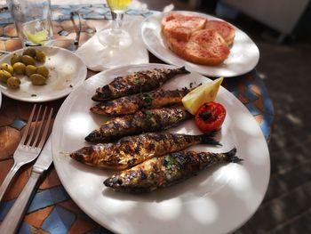 High angle view of food served on table