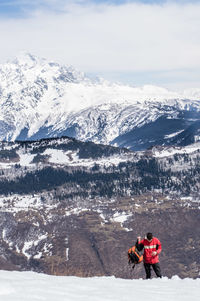 Scenic view of snow covered mountain against sky