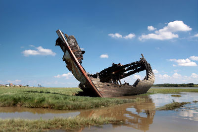 Ruined shipwreck on shore