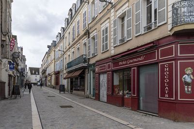 Street amidst buildings in city
