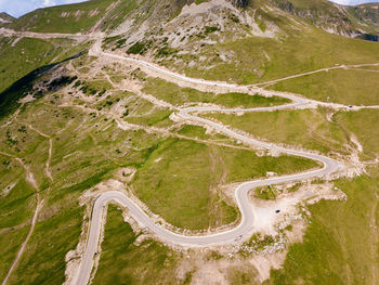 Winding and dangerous road from the high mountain pass in transalpina, romania