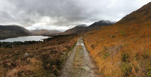 Panoramic view of lake and mountains against sky