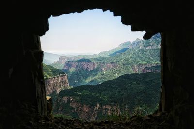 Built structure with mountain range in background