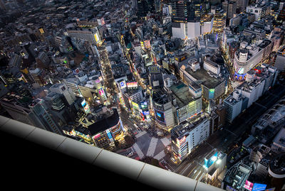 High angle view of illuminated buildings in city