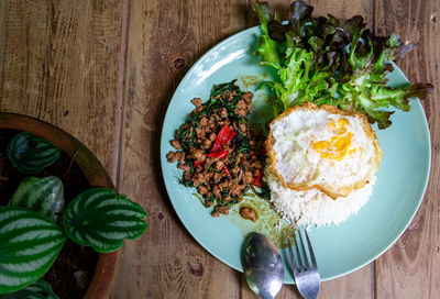 High angle view of breakfast served on table