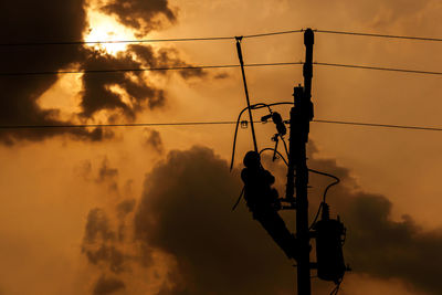 Low angle view of silhouette plant against sky during sunset