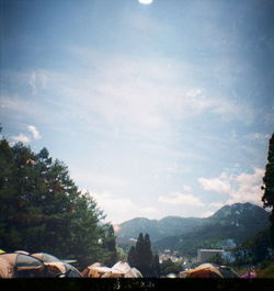 Man and mountains against sky