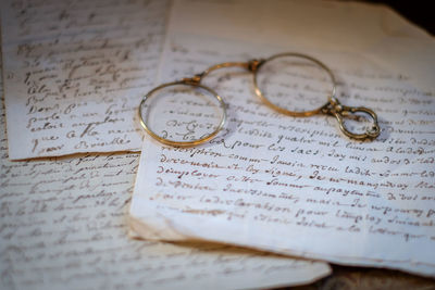 Close-up of pocket watch on table