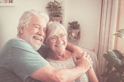 Portrait of happy friends at home