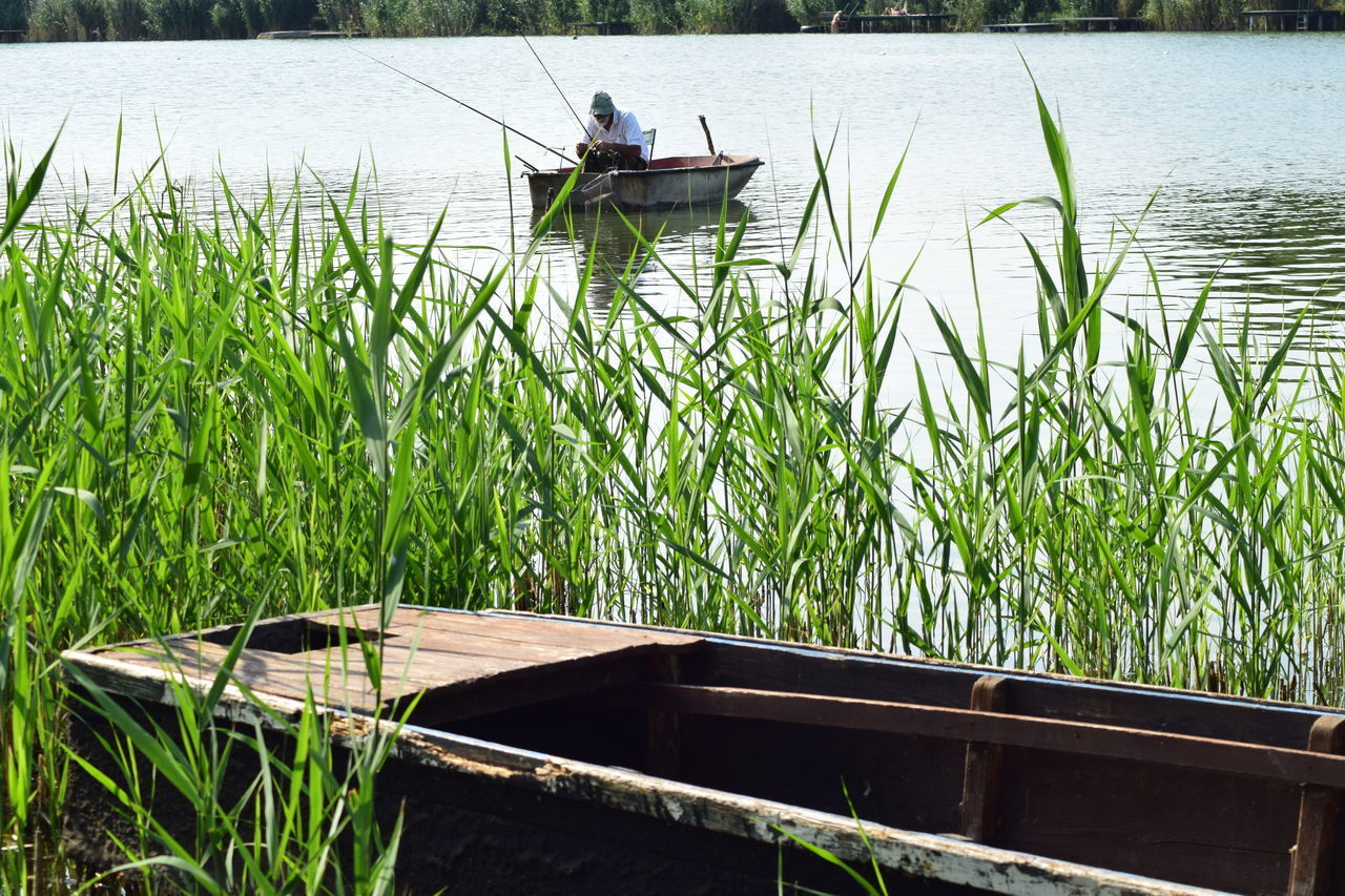 NAUTICAL VESSEL ON LAKE