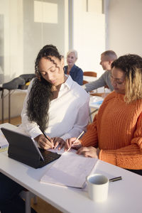 Women working together at workshop