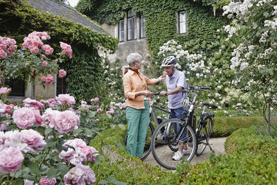 View of people on flowering plants