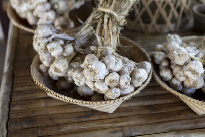Selective focus large bunch of garlic in the saplings of agricultural gardeners in thailand, 