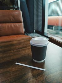 Close-up of coffee cup on table
