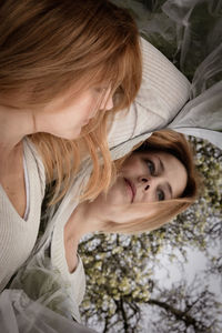 Close-up of young woman looking away