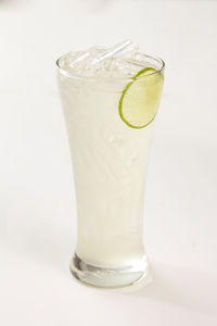 Close-up of drink against white background