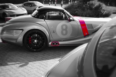 Close-up of vintage car on street