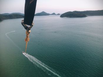 High angle view of rope in sea against sky