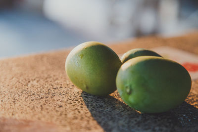 Close-up of apples on table