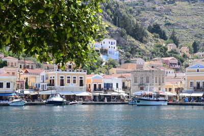 Boats moored at harbor