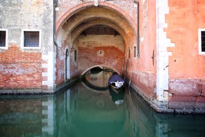 View of canal along buildings