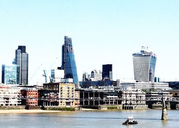 Cityscape against clear sky