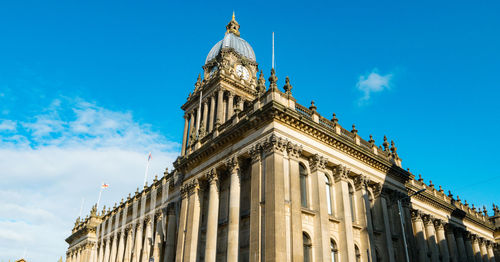 Low angle view of building against blue sky