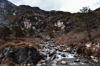 Scenic view of rocky mountains against sky