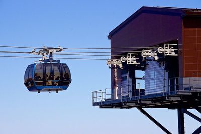 Low angle view of buildings against blue sky